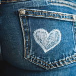 Drawing bleach designs on a pair of jeans