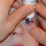 How to give eye drops to a young child or baby